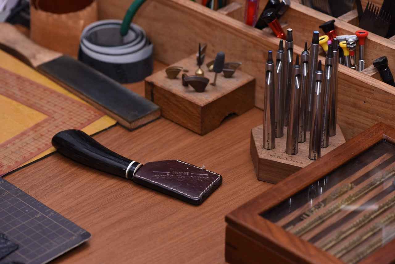 Leatherworking tools on Zenio’s workshop bench